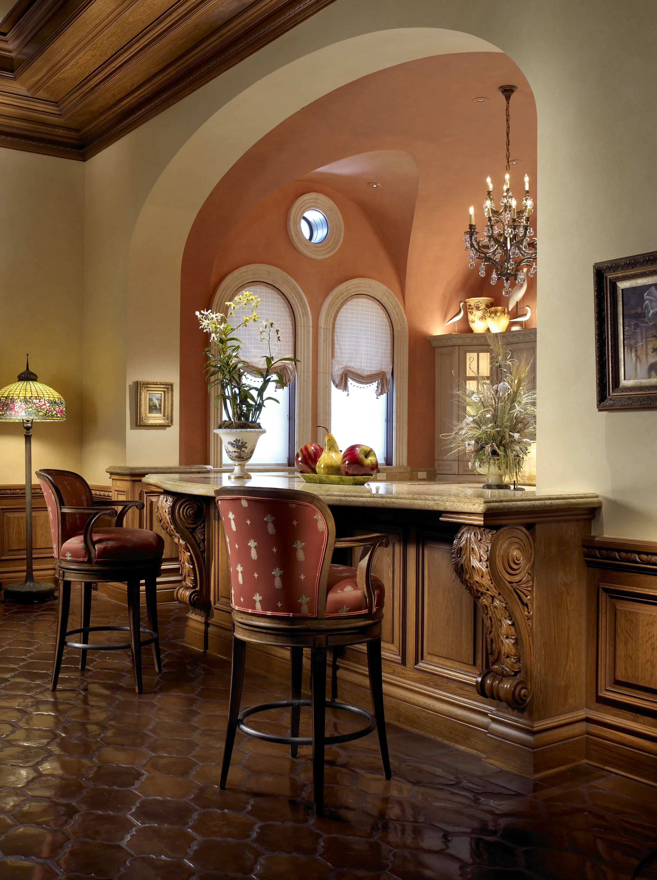 Custom architectural woodwork, cabinetry, and bar detailing in a private interior.